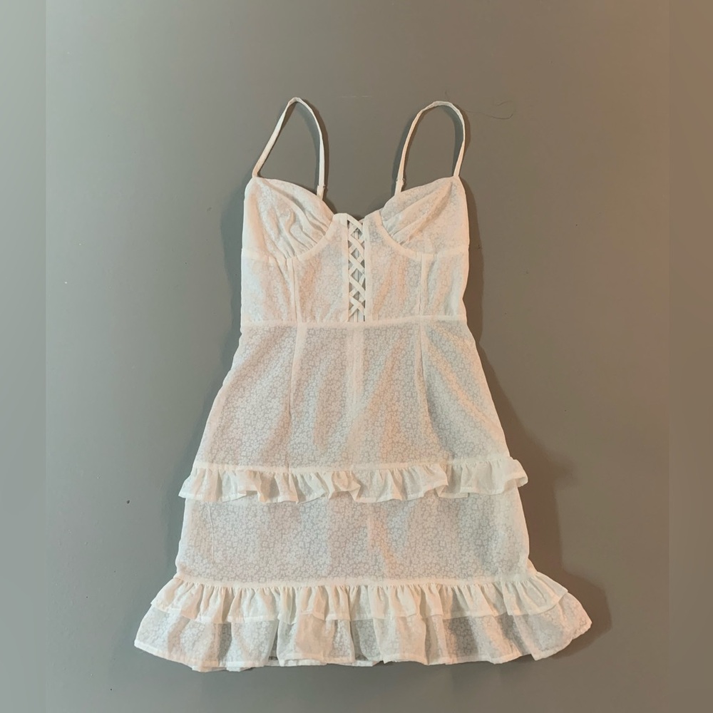 Chic White Ruffle Mini Dress with cut out